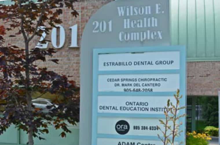 A pylon sign with Southern Ontario Dental College on it.